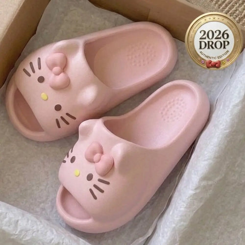 Pink Hello KT slide sandals in a cardboard box with tissue paper, featuring a 2026 Drop Authentic Edition seal in the top right corner.